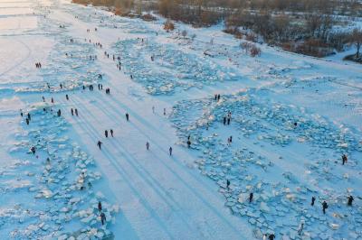 Blue ice blocks at Harbin Diamond Sea during sunset