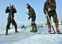 Workers Dig Ice from the Songhua River