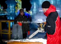 A Sculptor is Making an Ice Sculpture at Ice & Snow World