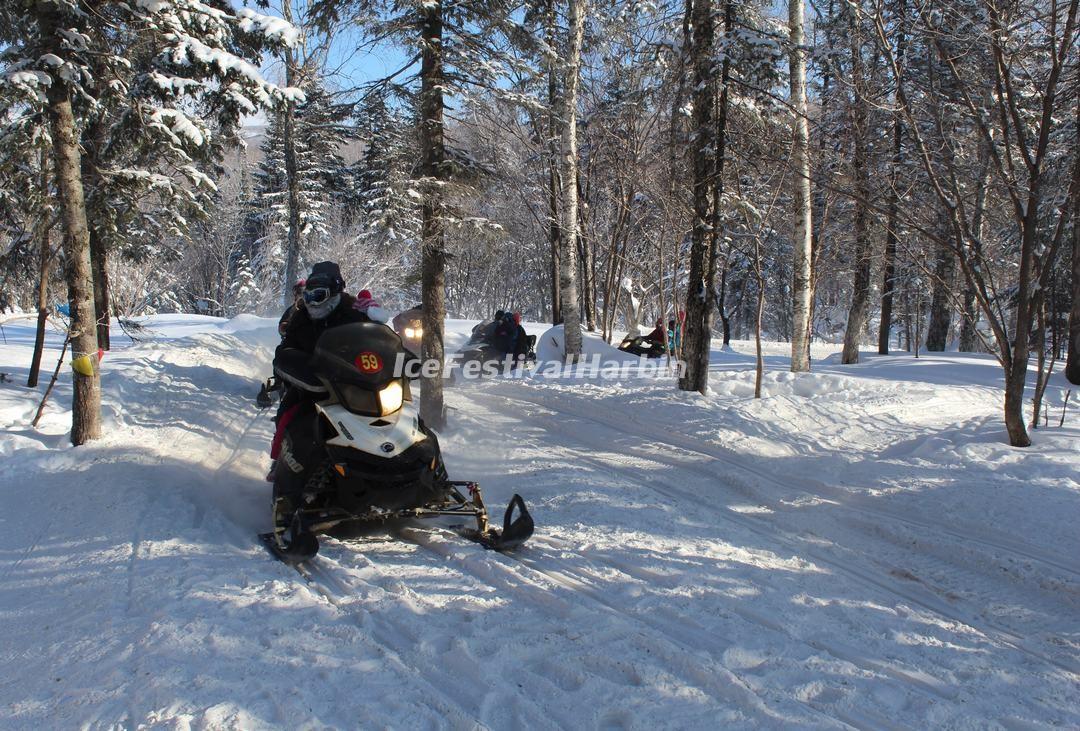 Snowmobile driving in China's Snow Town - Yangcao Mountain