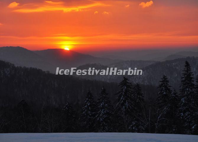 Sunrise Over Yangcao Mountain in China's Snow Town