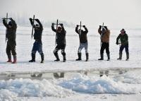 Workers Are Extracting Blocks of Ice