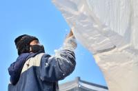 A Sculptor Is Making A Snow Sculpture in Harbin