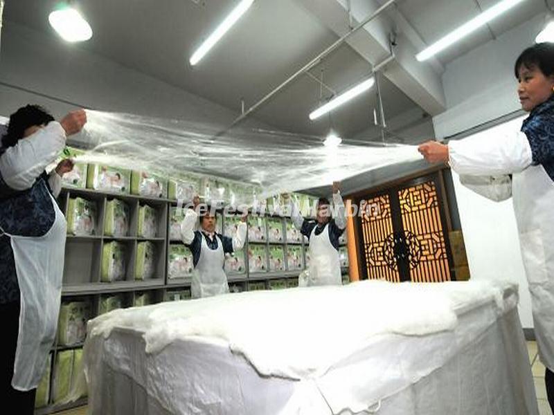 The Workers Are Making Silk Bedsheet in Jiangnan Silk Museum