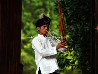 A Yang Man Plays the Lusheng at Sanjiang Dong Villages