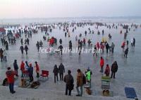 Tourists in Harbin Songhua River Ice and Snow Happy Valley 