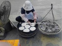 A Woman is Making Xizhou Baba (cake) in Xizhou Town